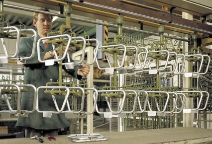 Racks with chair arms after pearl-brightness chromium plating